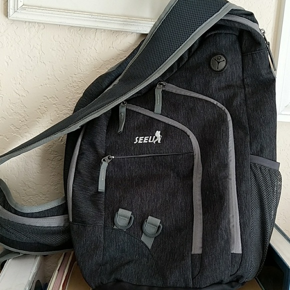 oversized sling backpack